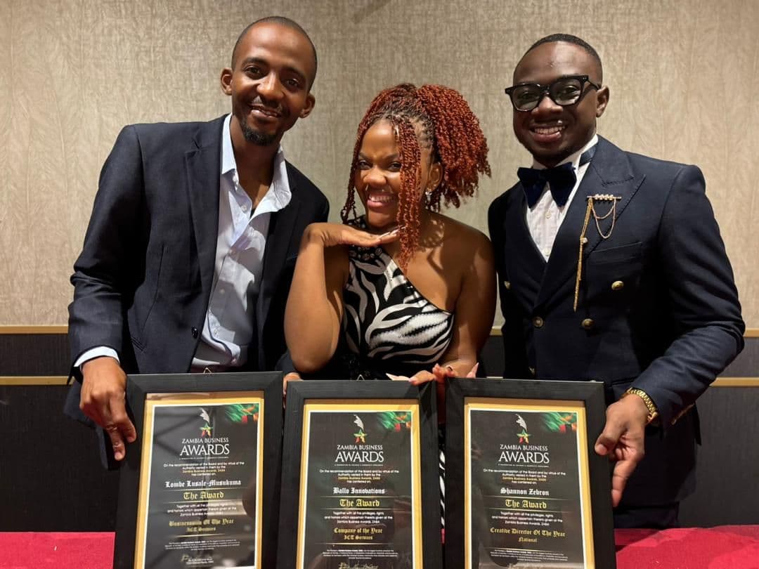 Three Ballo Innovations team members holding Zambia Business Awards certificates